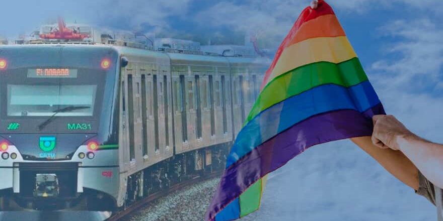 A imagem de uma bandeira LGBT e um trem.